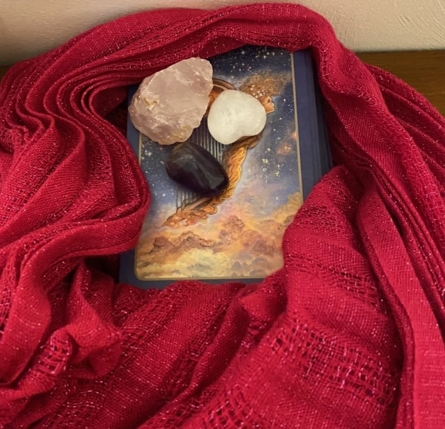 Storing your relationship tarot deck with amethyst quartz selenite in a scarf